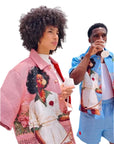 Two people wearing clothing with artistic prints in an urban setting.