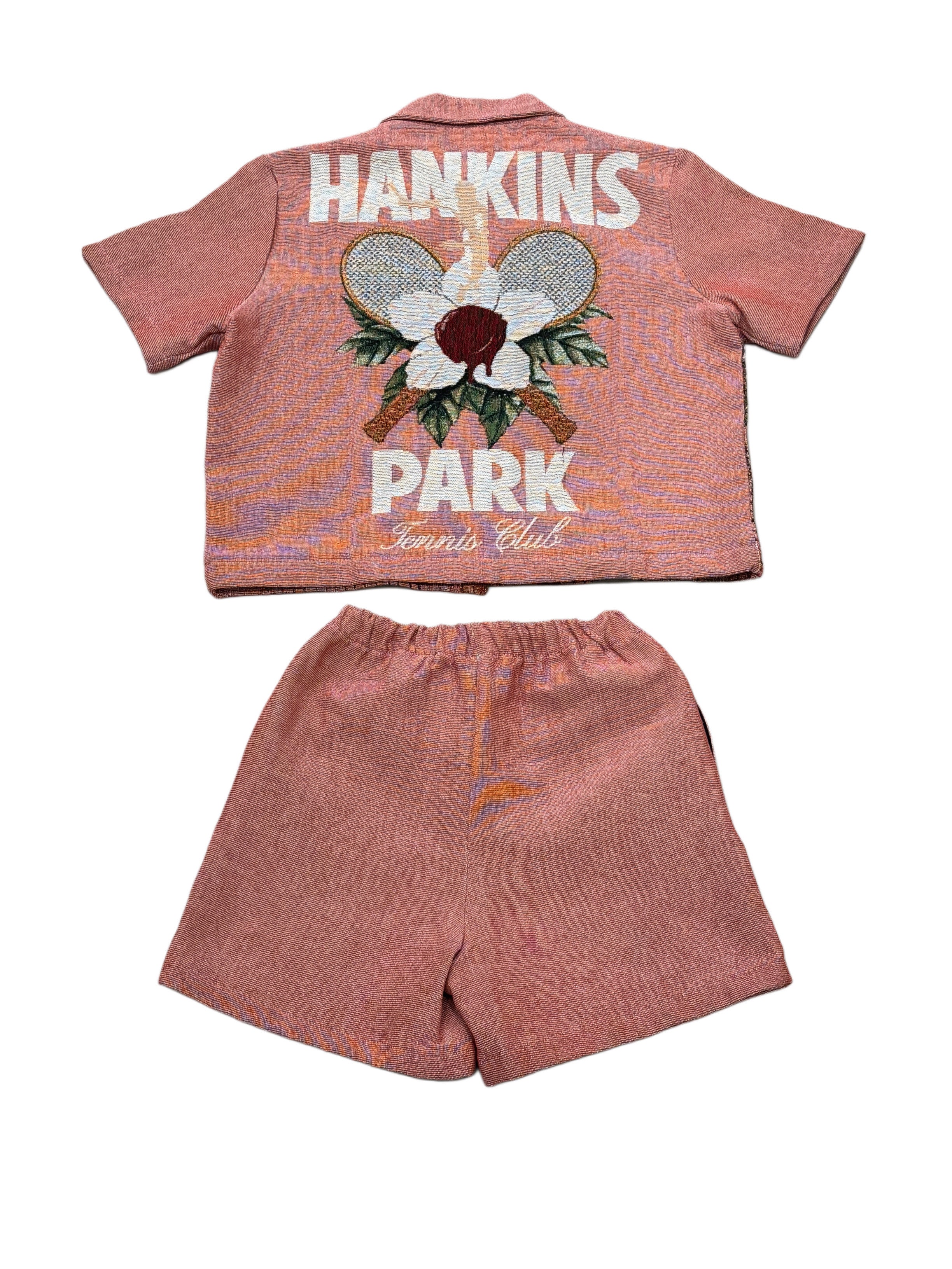 Hankins Park Lady in Bloom salmon tapestry set, back view with woven 
crossed rackets and magnolia crest | SAINT MILES Outfit Sets