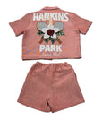 Hankins Park Lady in Bloom salmon tapestry set, back view with woven 
crossed rackets and magnolia crest | SAINT MILES Outfit Sets